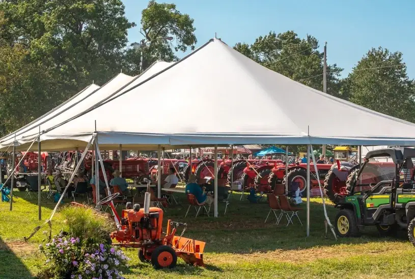 large pole tent at outdoor festival