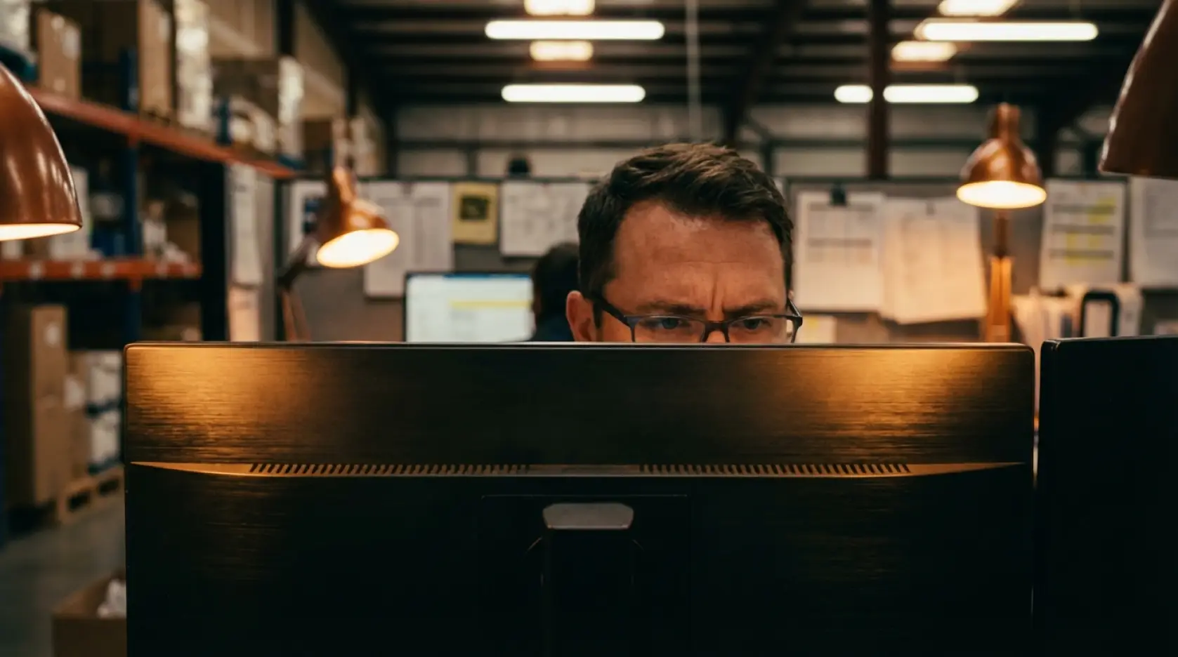 Event rental business owner setting up software dashboard for the first time